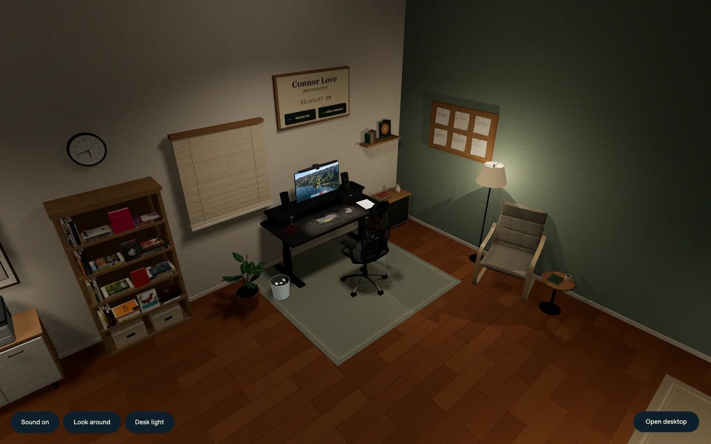The room after dark with the blinds closed and the desk and reading lights on.